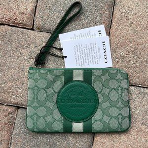 coach jacquard wristlet